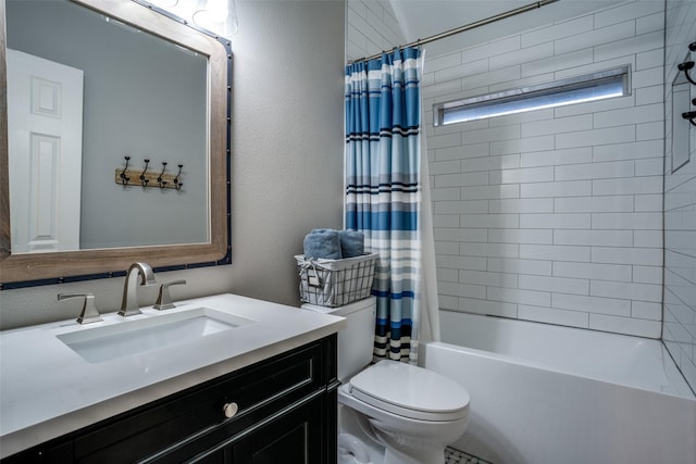 full bathroom with vanity, shower / bath combination with curtain, and toilet