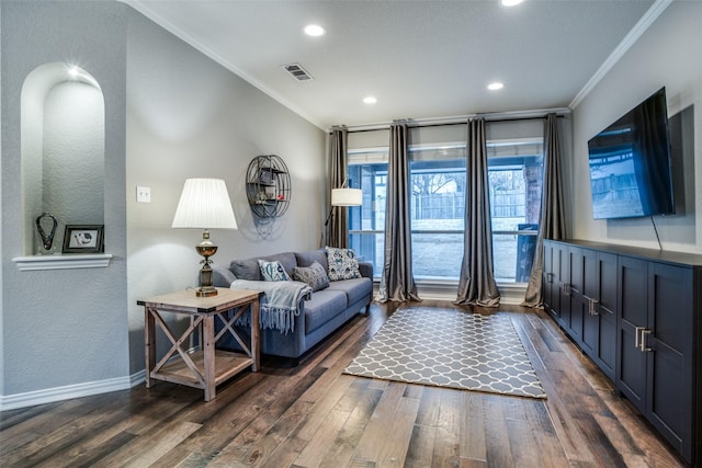 interior space featuring ornamental molding and dark hardwood / wood-style floors