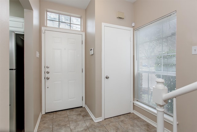 view of tiled foyer entrance