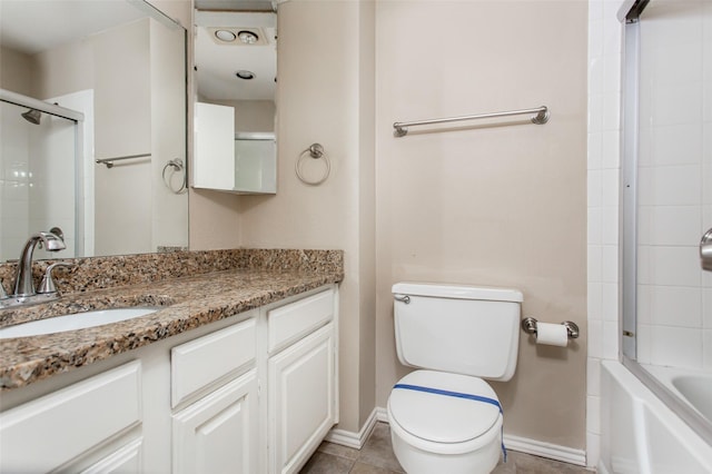 full bathroom featuring vanity, combined bath / shower with glass door, tile patterned floors, and toilet