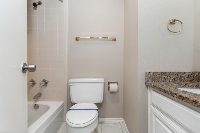 full bathroom featuring tiled shower / bath combo, vanity, and toilet