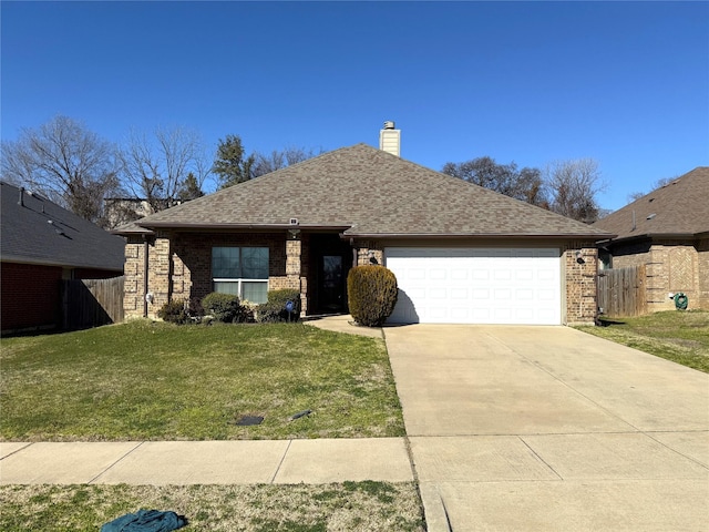 single story home with a garage and a front yard