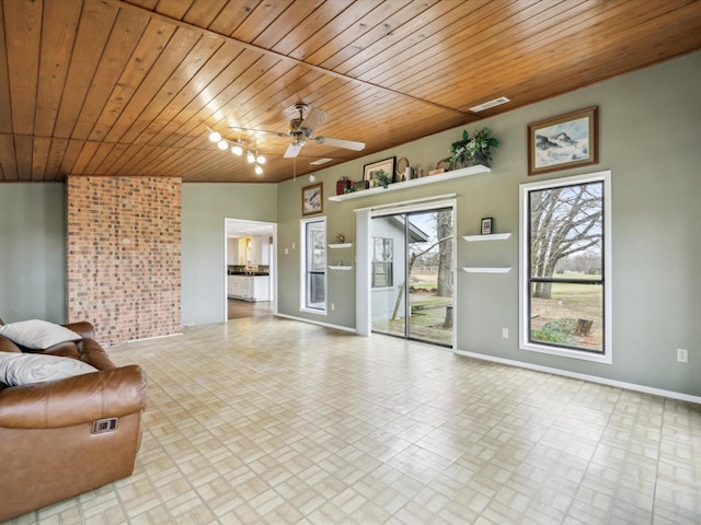 unfurnished living room featuring wood ceiling and ceiling fan