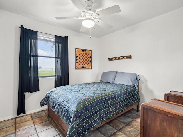 bedroom featuring ceiling fan