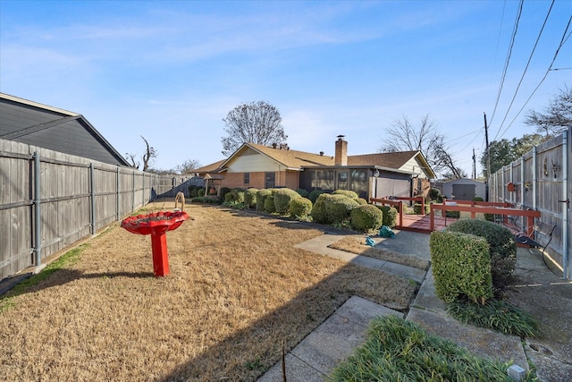 view of yard with a deck