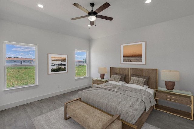 bedroom featuring hardwood / wood-style flooring and ceiling fan