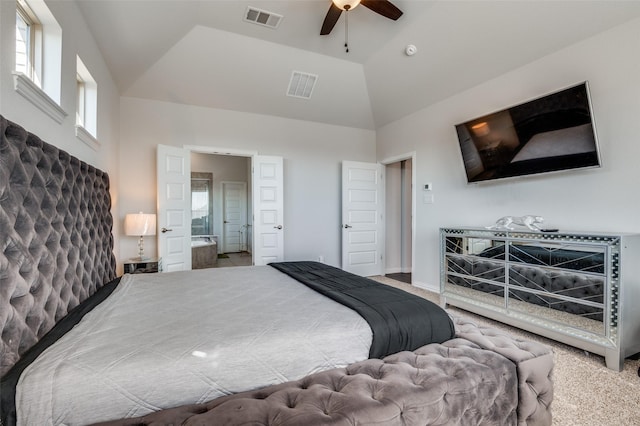 carpeted bedroom with ceiling fan and high vaulted ceiling