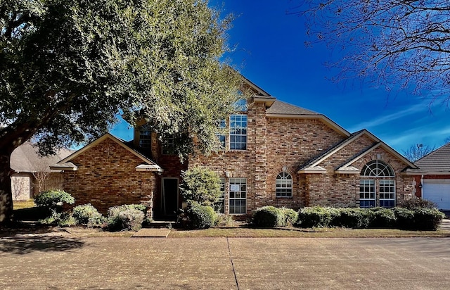 view of property featuring a garage