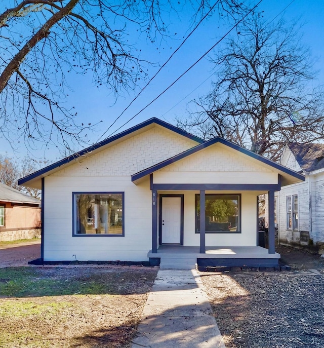 view of front of home featuring covered porch