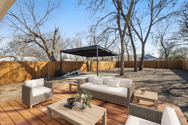 wooden deck with an outdoor living space