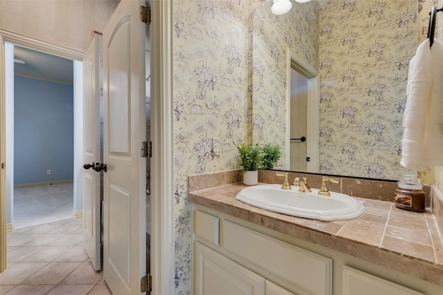 bathroom with tile patterned flooring and vanity