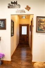 hallway featuring dark hardwood / wood-style floors