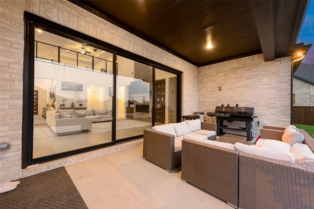 view of patio / terrace with grilling area, outdoor lounge area, and a balcony