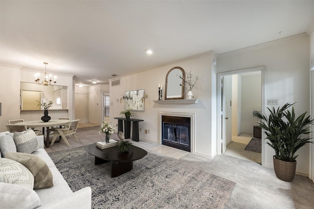 living room featuring a notable chandelier, light colored carpet, and ornamental molding