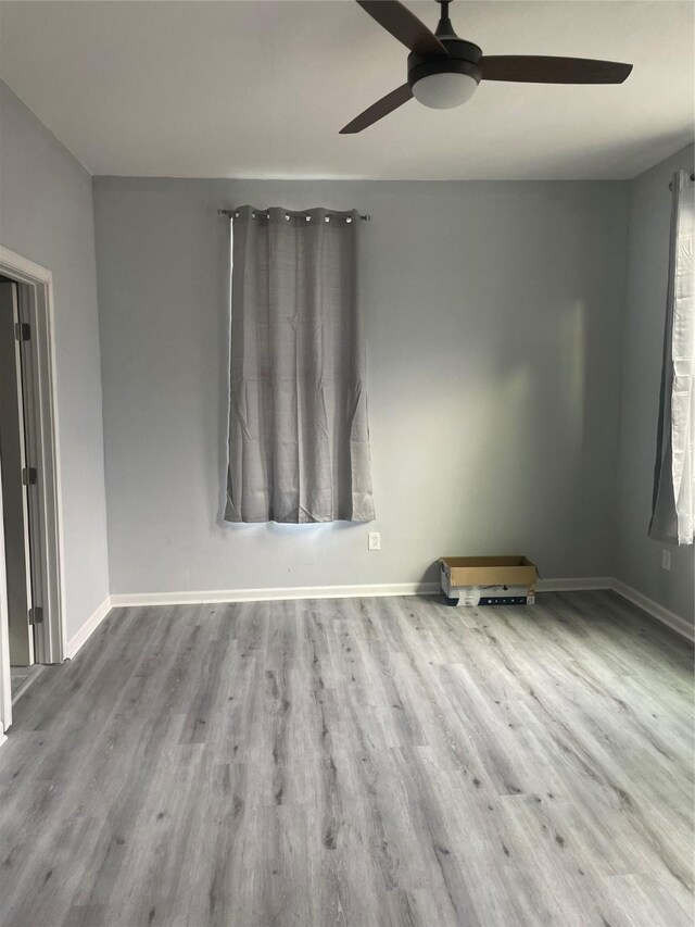 unfurnished dining area featuring hardwood / wood-style floors and a chandelier