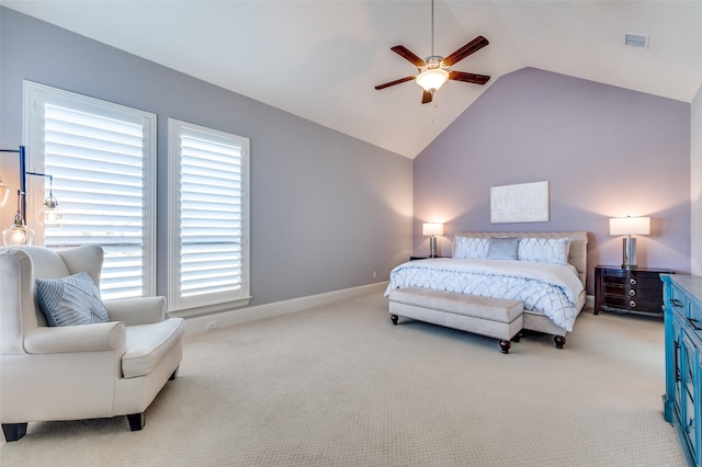 bedroom featuring ceiling fan, lofted ceiling, and light carpet