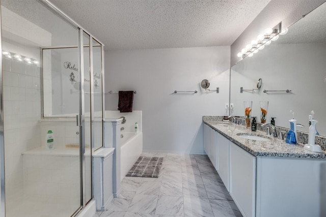 bathroom with independent shower and bath and a textured ceiling