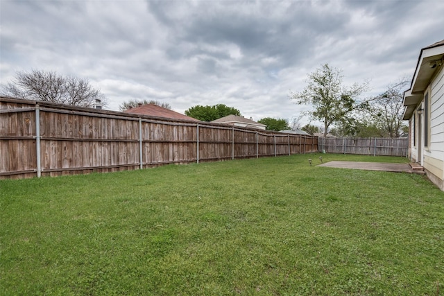 view of yard with a patio area