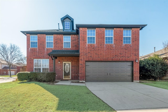 view of front of property featuring a garage and a front lawn