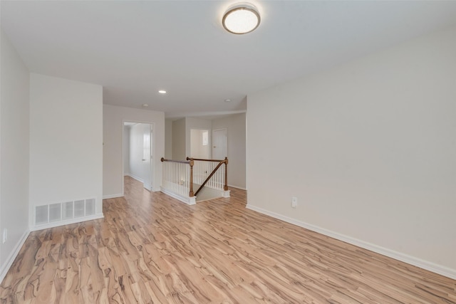 empty room with light wood-type flooring