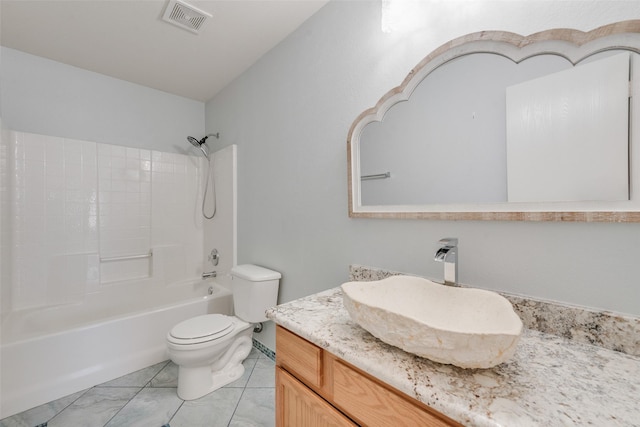 full bathroom with toilet, tile patterned floors, vanity, and shower / washtub combination