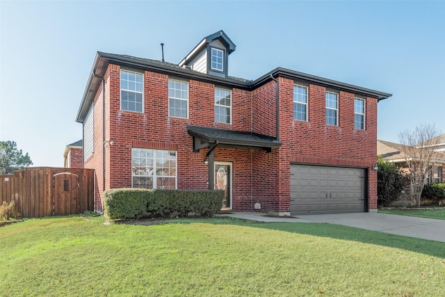 view of front of home with a garage and a front yard