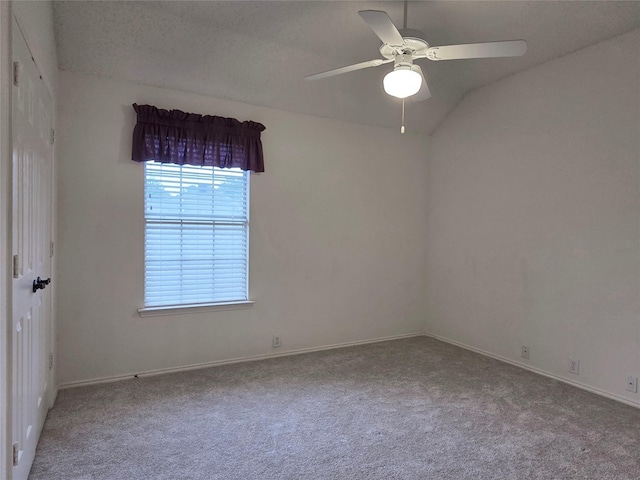 6464 Richmond Dr, Frisco, TX 75035 - spare room featuring carpet flooring, ceiling fan, baseboards, and vaulted ceiling