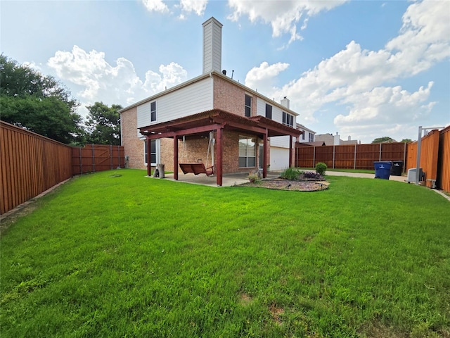 6464 Richmond Dr, Frisco, TX 75035 - rear view of house featuring a chimney, a patio area, and brick siding