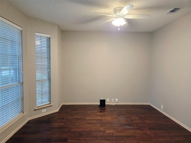 6464 Richmond Dr, Frisco, TX 75035 - spare room featuring wood finished floors, ceiling fan, a textured ceiling, and baseboards