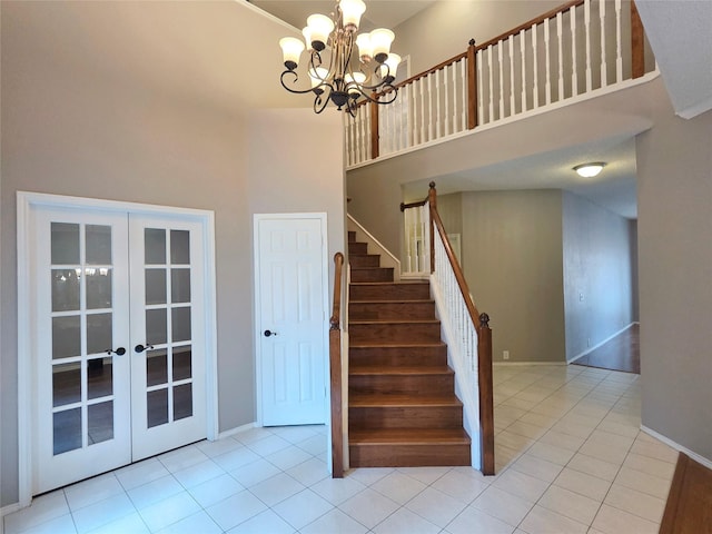 6464 Richmond Dr, Frisco, TX 75035 - staircase featuring a high ceiling, french doors, tile patterned floors, a chandelier, and baseboards