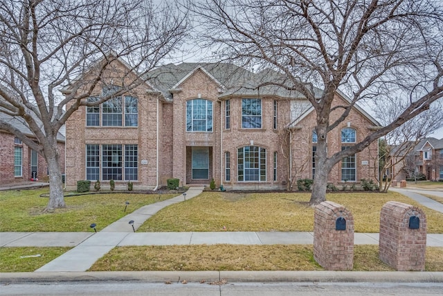 view of front facade with a front lawn