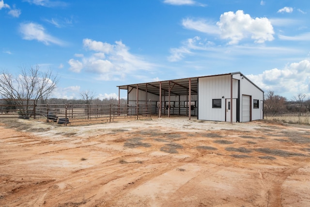 view of outdoor structure featuring a rural view