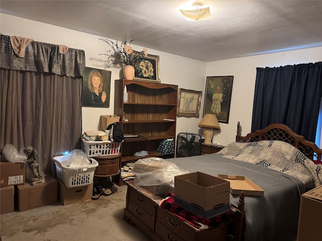 carpeted bedroom featuring a textured ceiling