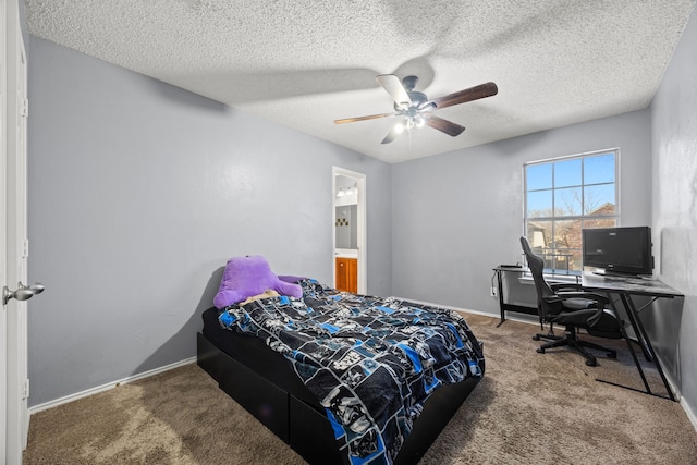 bedroom featuring a textured ceiling, ceiling fan, and carpet