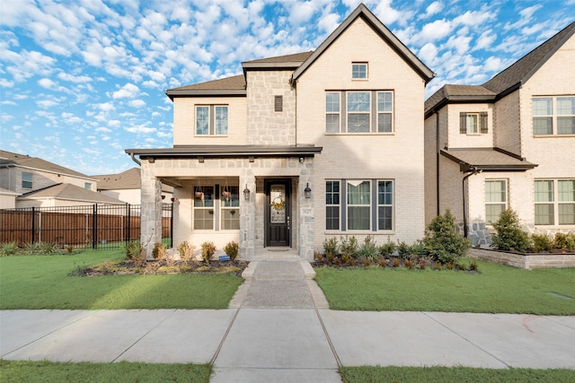 view of front of property with a front lawn