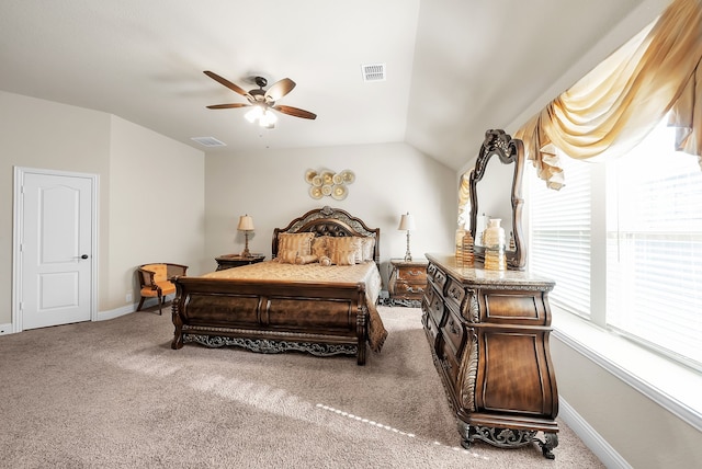 bedroom featuring vaulted ceiling, ceiling fan, and carpet