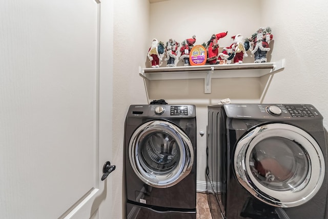 washroom featuring independent washer and dryer