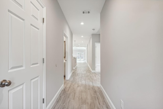 hall featuring light wood-type flooring