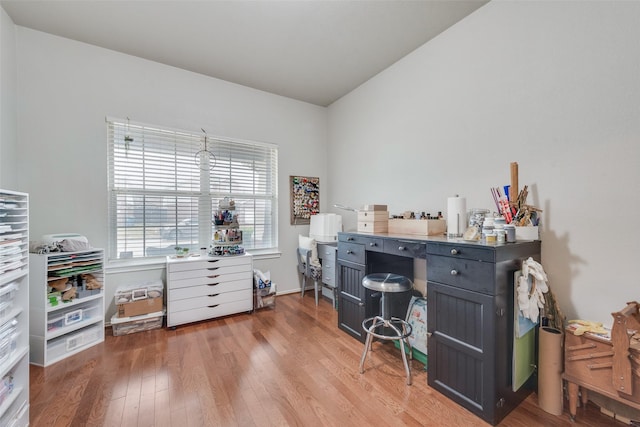 office with hardwood / wood-style floors