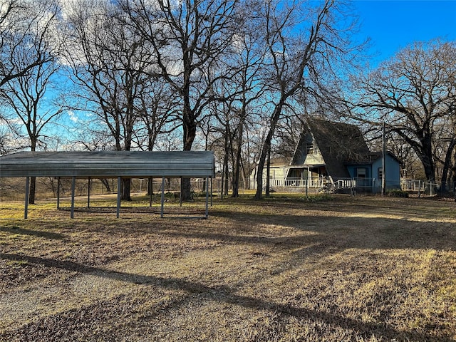 view of yard with a carport