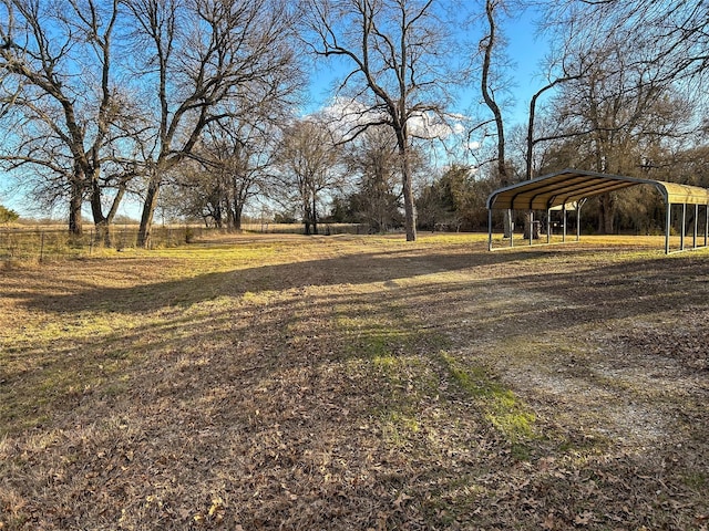 view of yard with a carport