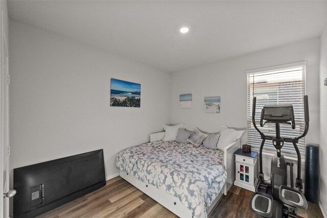 bedroom featuring hardwood / wood-style floors