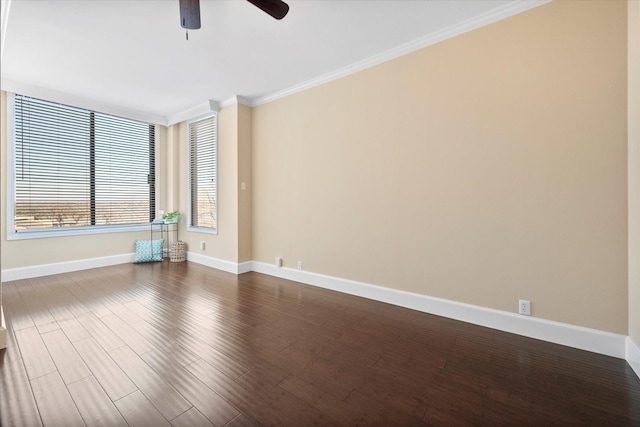 spare room with hardwood / wood-style flooring, ornamental molding, and ceiling fan