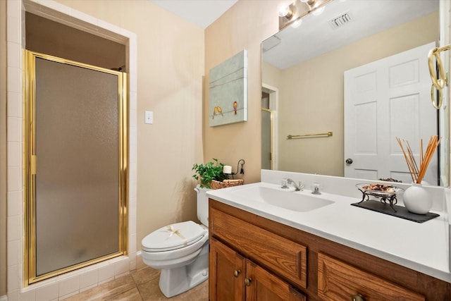 bathroom featuring vanity, toilet, tile patterned flooring, and a shower with door