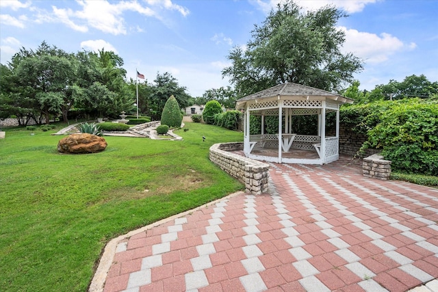 view of yard with a gazebo and a patio