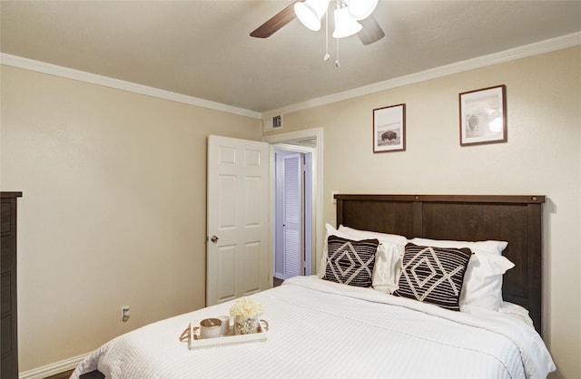 bedroom with crown molding and ceiling fan