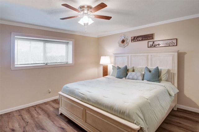 bedroom featuring ceiling fan, ornamental molding, and light hardwood / wood-style floors