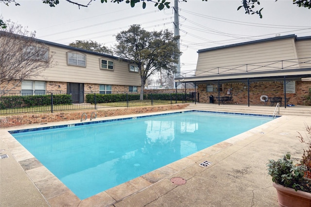 view of pool with a patio area