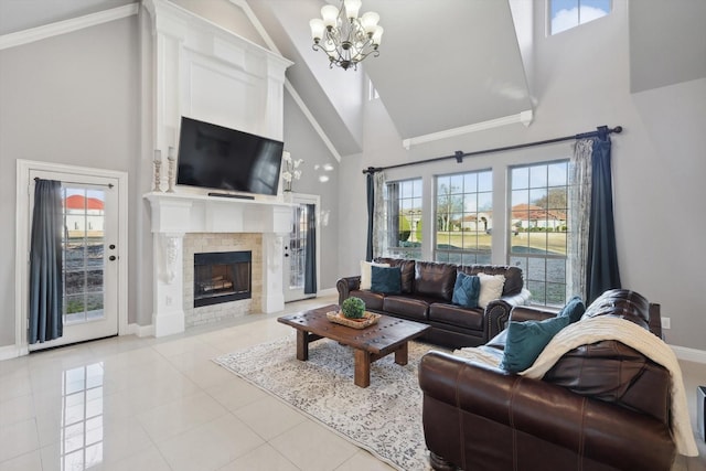 living room with an inviting chandelier, high vaulted ceiling, and light tile patterned floors