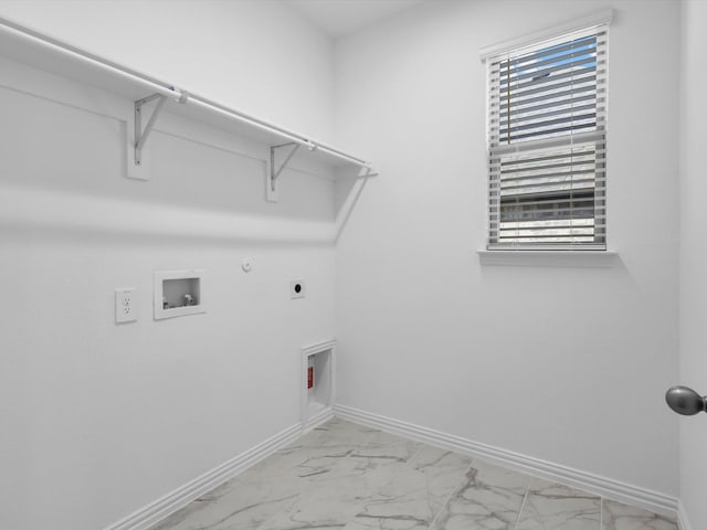 clothes washing area featuring gas dryer hookup, plenty of natural light, washer hookup, and hookup for an electric dryer